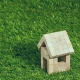 block house in grass - real estate video marketing representation